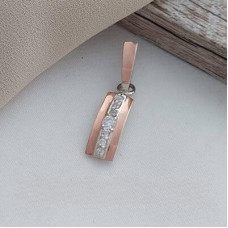 Silver pendant with gold soldering and white zircons