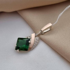 Silver pendant with gold inserts and zircons