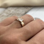 Срібна каблучка із золотими вставками та одним цирконом
