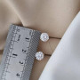 Сережки пусети срібні з позолотою та білими фіанітами
