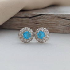 Сережки пусети срібні з блакитними топазами та білими цирконами