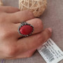 Перстень жіночій срібний з великим овальним коралом та чорнінням