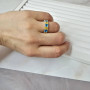 Срібна каблучка з жовтими та блакитними фіанітами доріжка