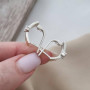 Сережки зі срібла з золотими напайками та білими круглими фіанітами