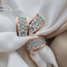 Silver sets with gold plates and white and blue zirconia