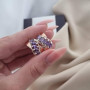 Срібний комплект із золотими вставками та фіолетовими кубічними цирконами