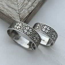 Silver wedding rings with floral ornament, pair