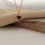 Thin chain gold necklace with heart pendant and black enamel