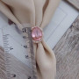 Комплект золотий каблучка та сережки з овальним рожевим гранатом і фіанітами 19.63
