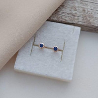 Сережки вкрутки золоті з синьою круглою шпинеллю 1.76