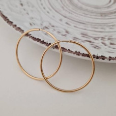 Smooth gilded silver hoop earrings without stones