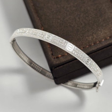 Браслет срібний жорсткий з орнаментом і розсипом фіанітів