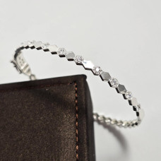 Браслет срібний жорсткий з білими круглими фіанітами