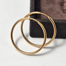 Smooth gilded hoop earrings without stones