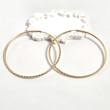 Silver hoop earrings with gold plating and diamond cut without stones