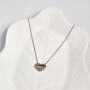 Yellow gold heart necklace with multi-colored enamel inserts, blue and yellow, patriotic