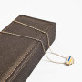 Yellow gold heart necklace with multi-colored enamel inserts, blue and yellow, patriotic