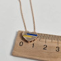 Yellow gold heart necklace with multi-colored enamel inserts, blue and yellow, patriotic