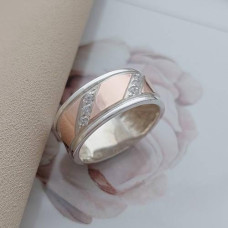 Wide silver ring with gold soldering and white zircons