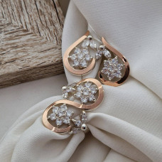 Silver set: earrings and ring in the form of flowers with gold soldering and cubic zirconia