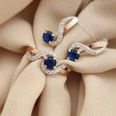 Silver sets with gold plates and colored zircon