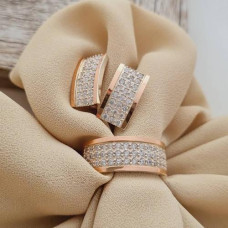 Silver set: ring and earrings with gold soldering and white zircon stripes