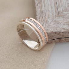 Wedding ring with a gold overlay and a track of white zircons