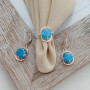 Комплект срібний із золотими напайками та блакитним камінням