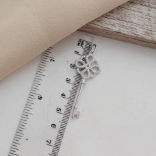 Openwork silver pendant key with white cubic zirconia