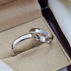 Thin classic American silver wedding rings, pair