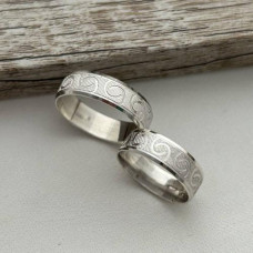 Silver wedding rings with ornament, rhodium plated, pair